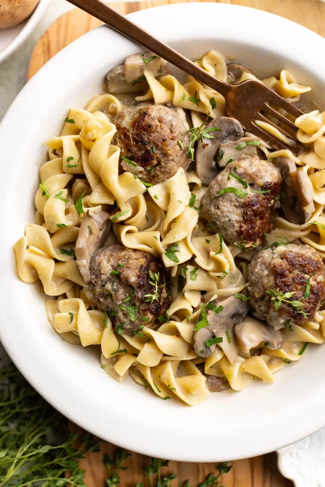 a bowl of beef stroganoff meatballs.
