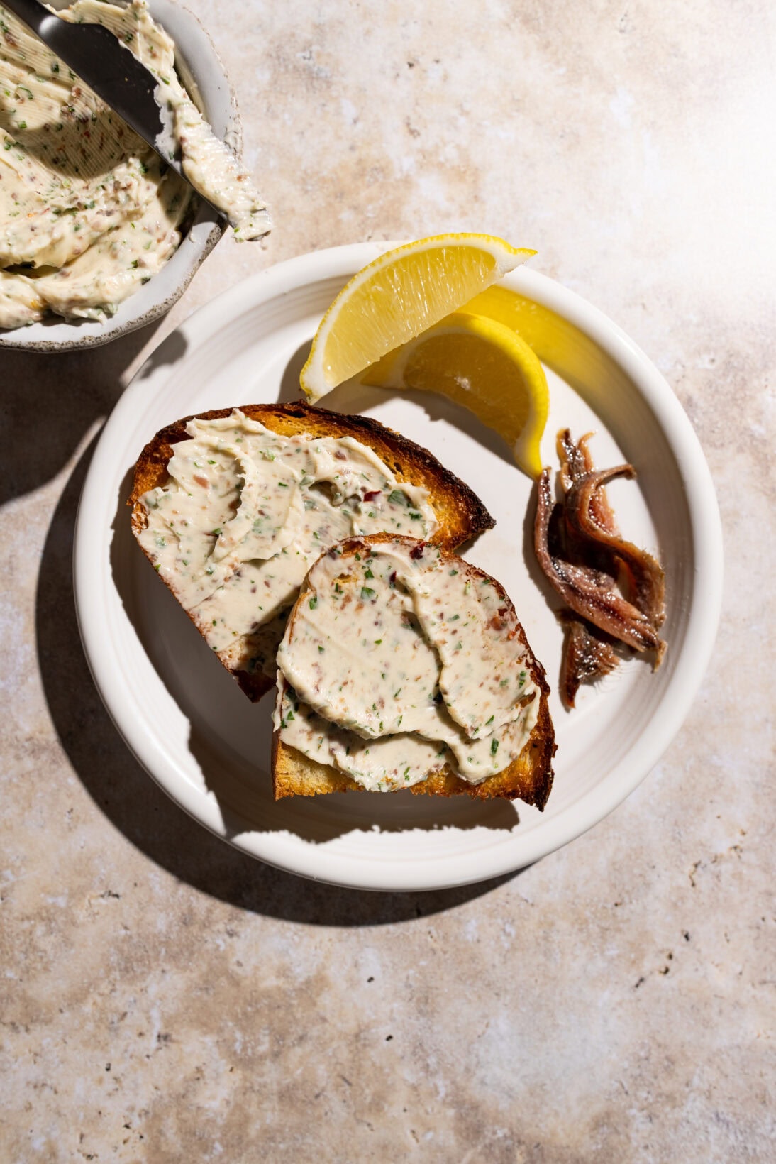 anchovy butter spread on toasted sourdough.