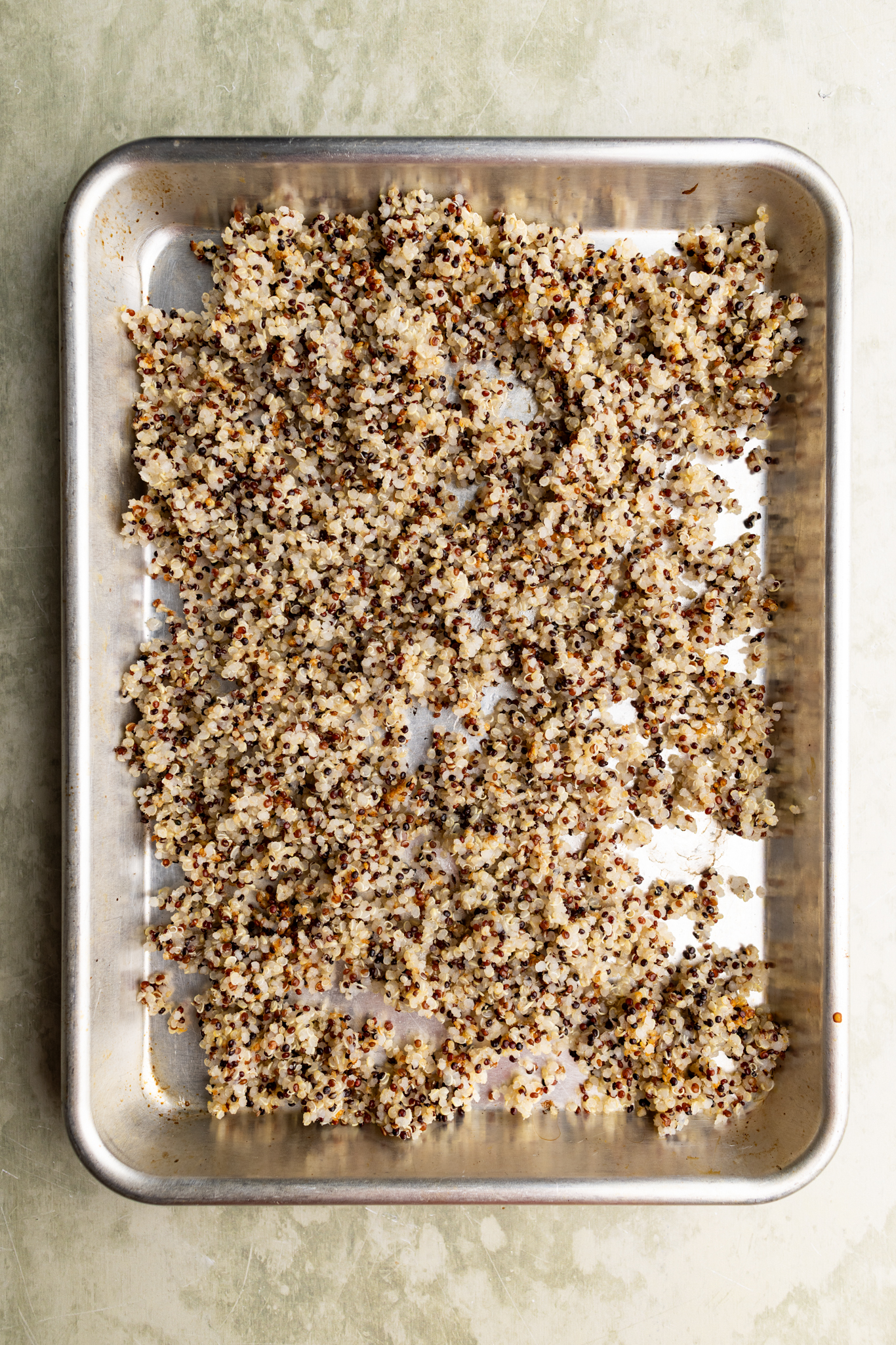 step by step: roasting the cooked quinoa.