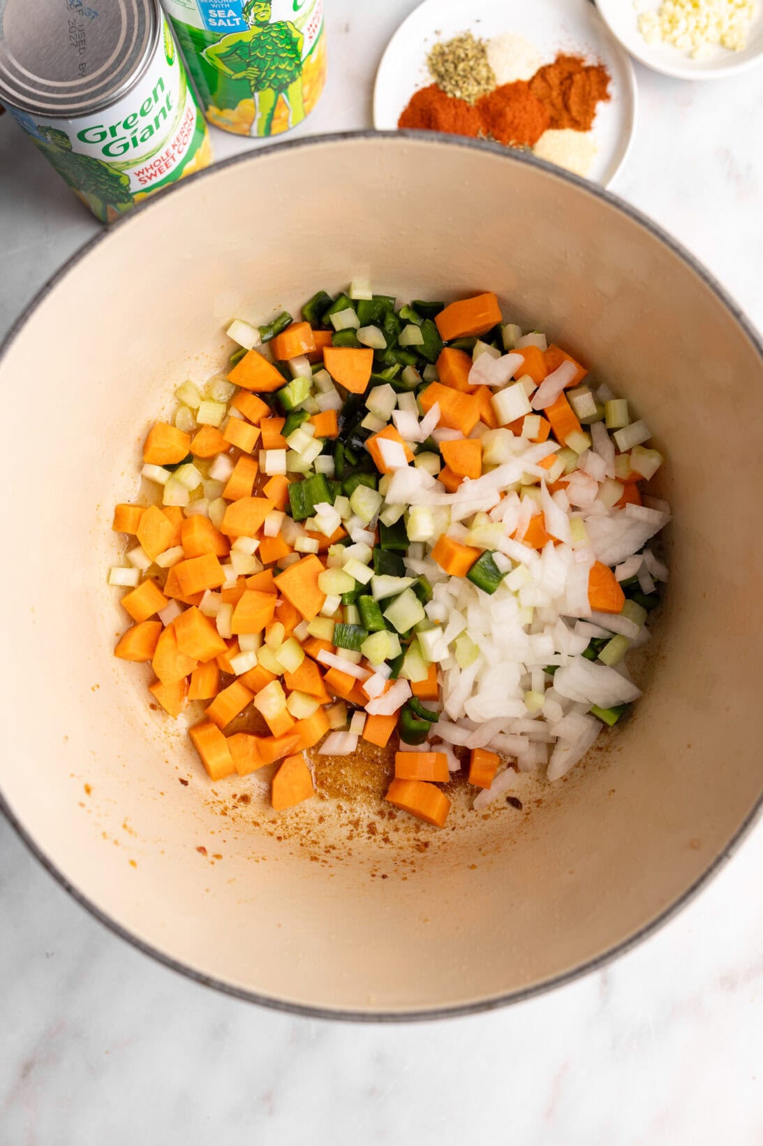 step by step: booking down the carrots, onions, peppers, and celery