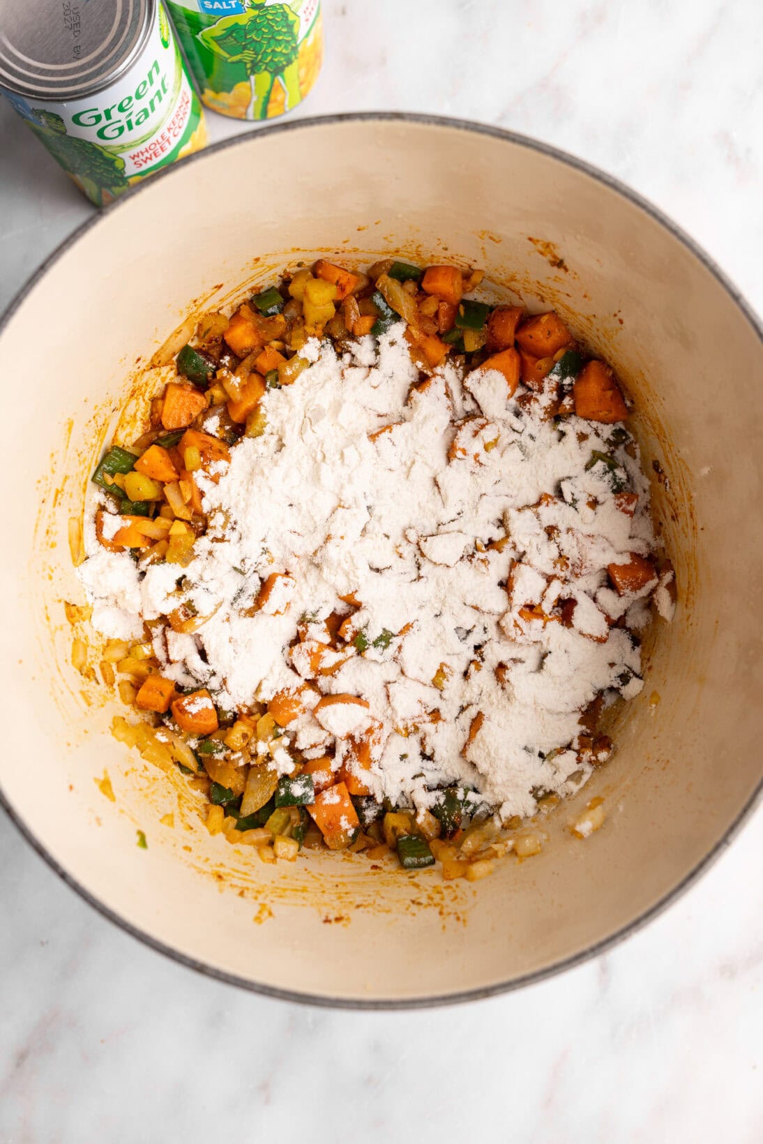 step by step: adding the flour to the pot.