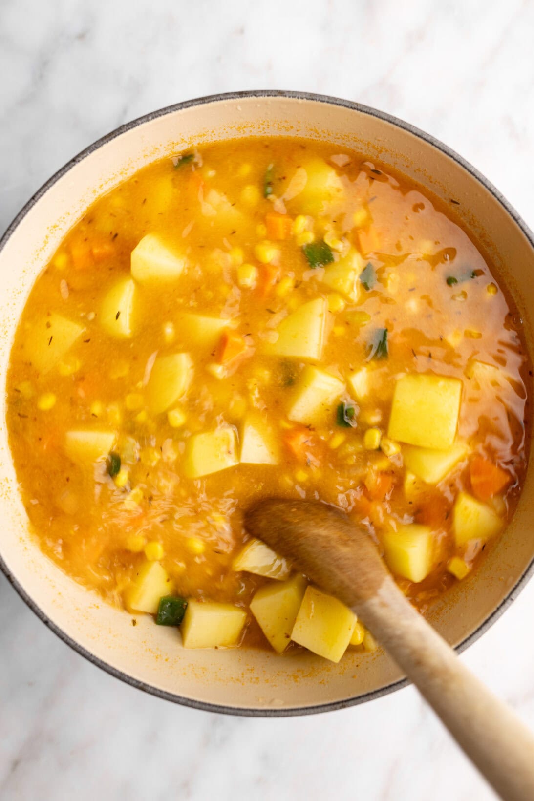 step by step: mixing the shrimp and corn chowder