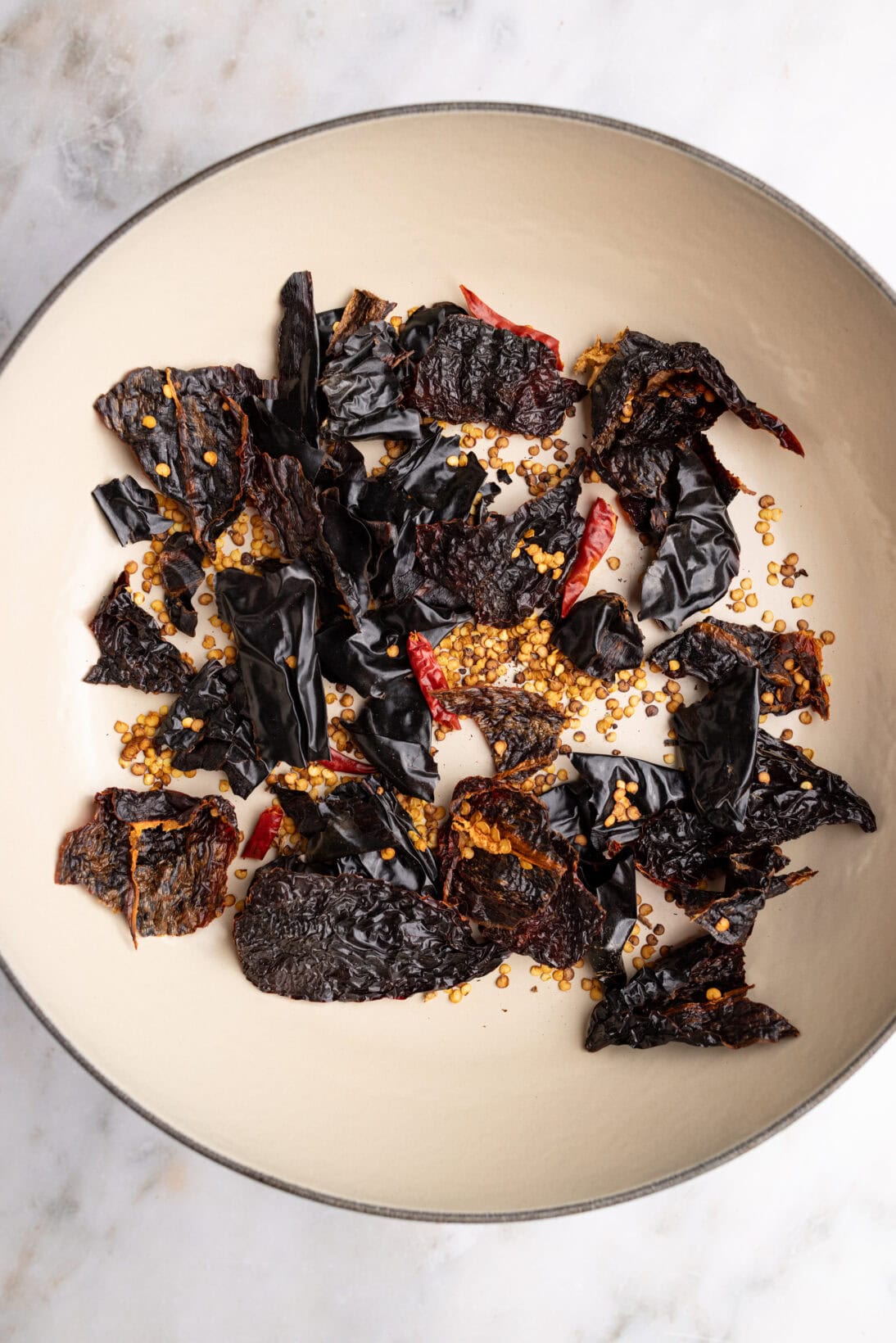 step by step: toasting the dried chiles.