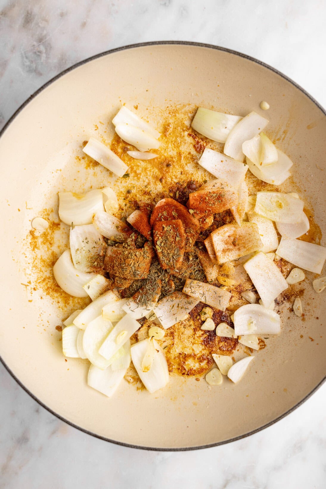 step by step: cooking the onions, garlic, and spices