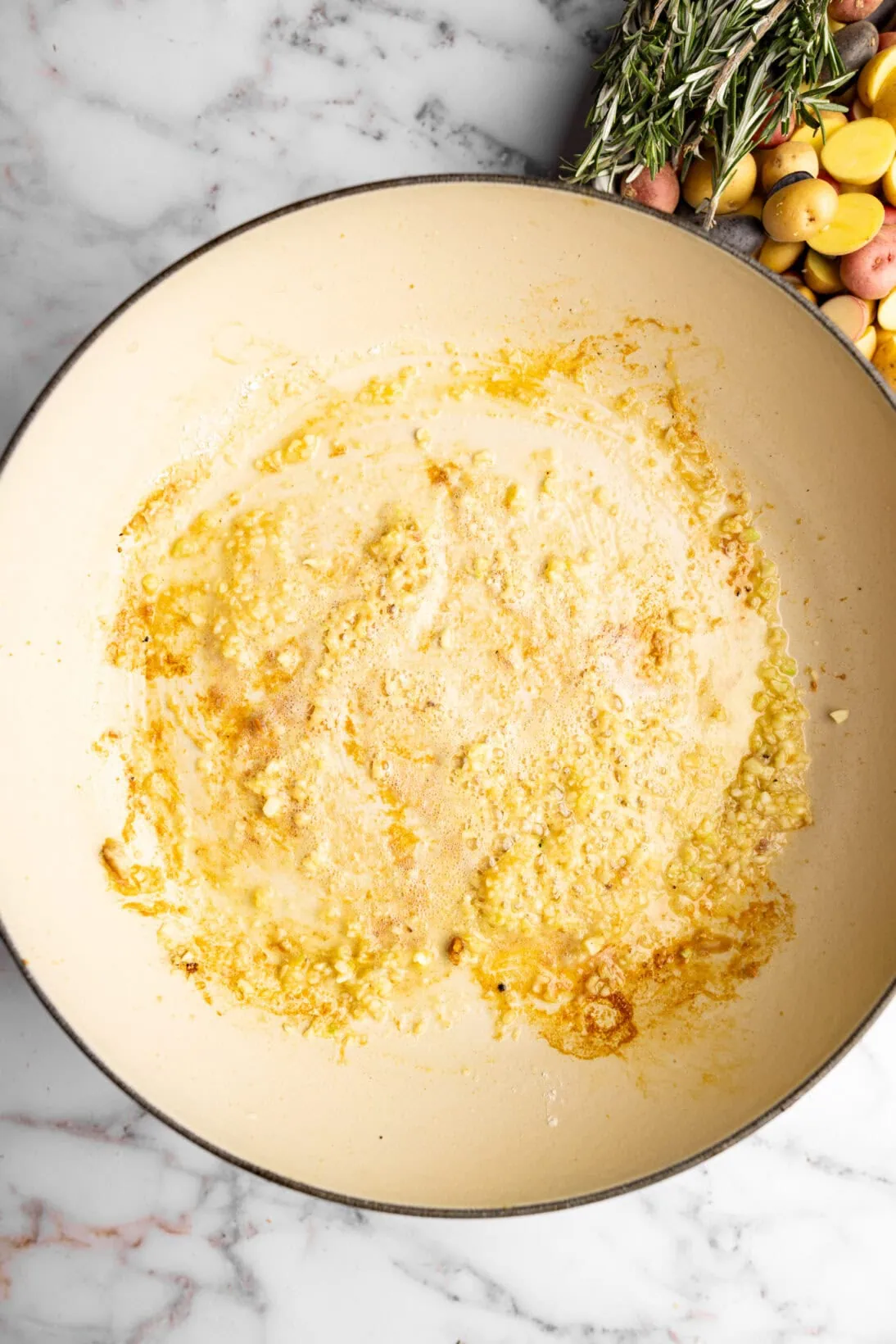 step by step: chicken removed, sautรฉing the garlic.