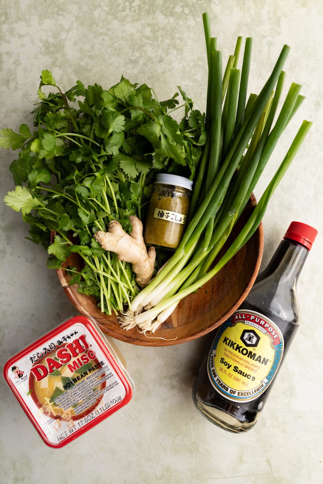 ingredients for the soup ( miso,soy, cilantro, scallions, ginger, garlic, yuzu kosho)