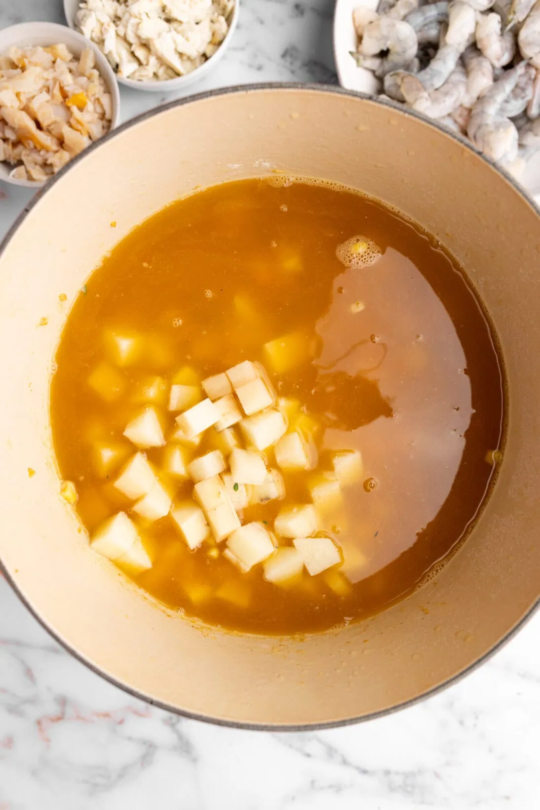 step by step: broth and potatoes added to the chowder