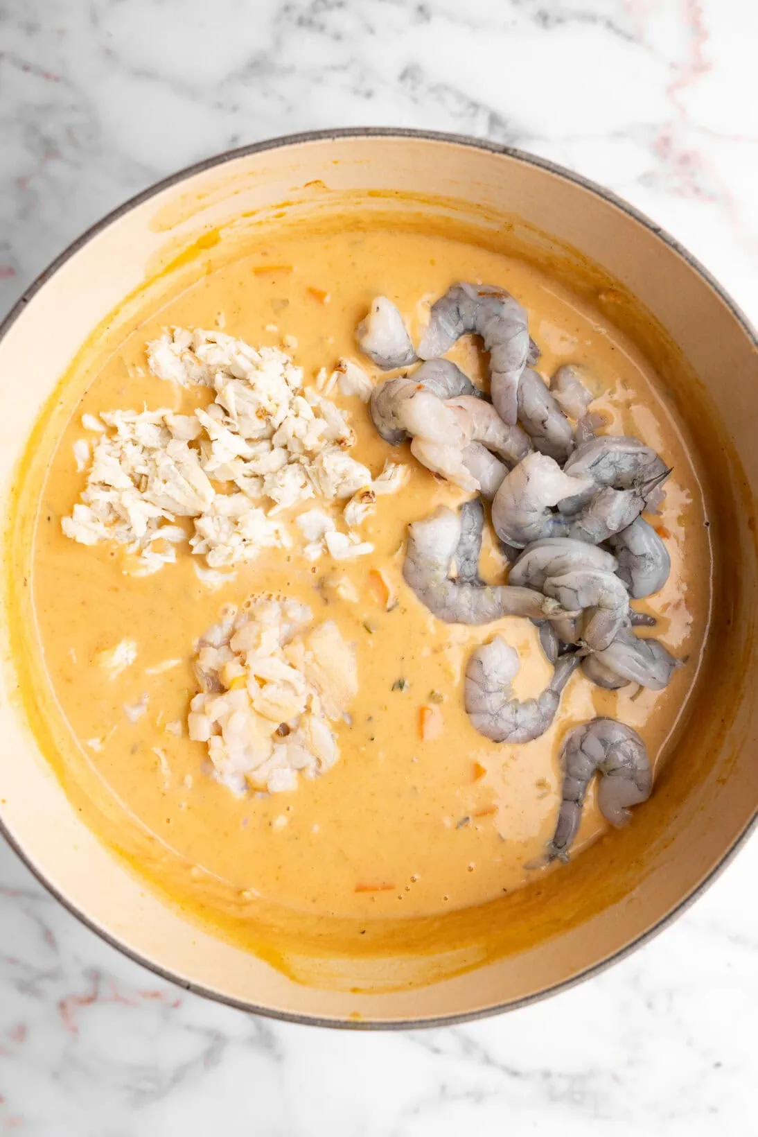 step by step: last step, added the heavy cream and the seafood.