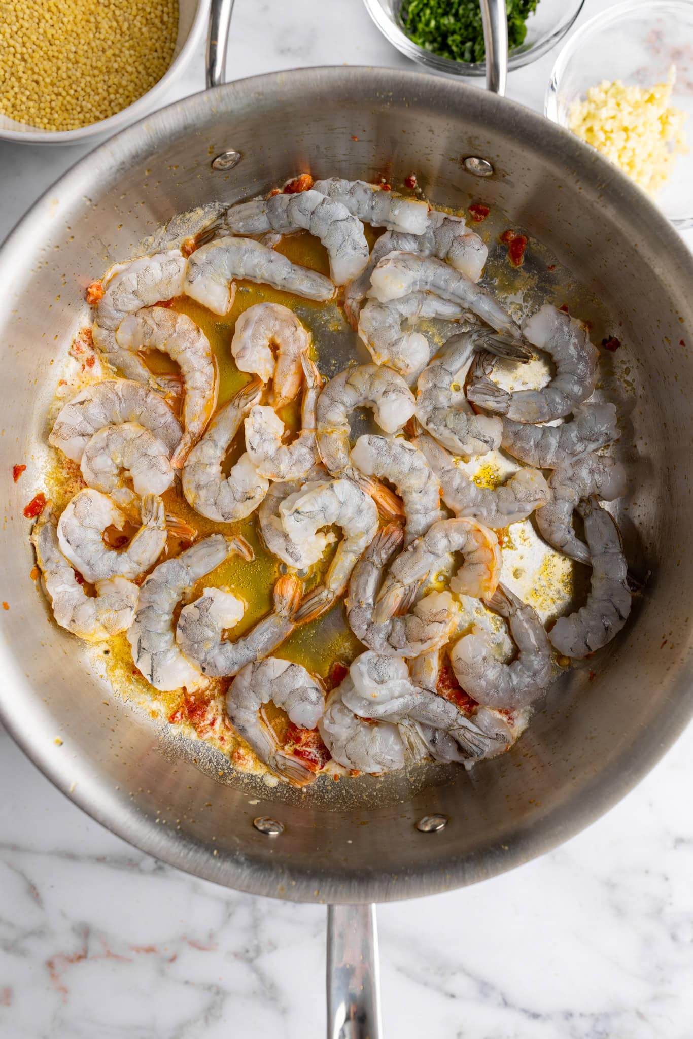 step by step: searing the shrimp in butter and Calabrian chilis