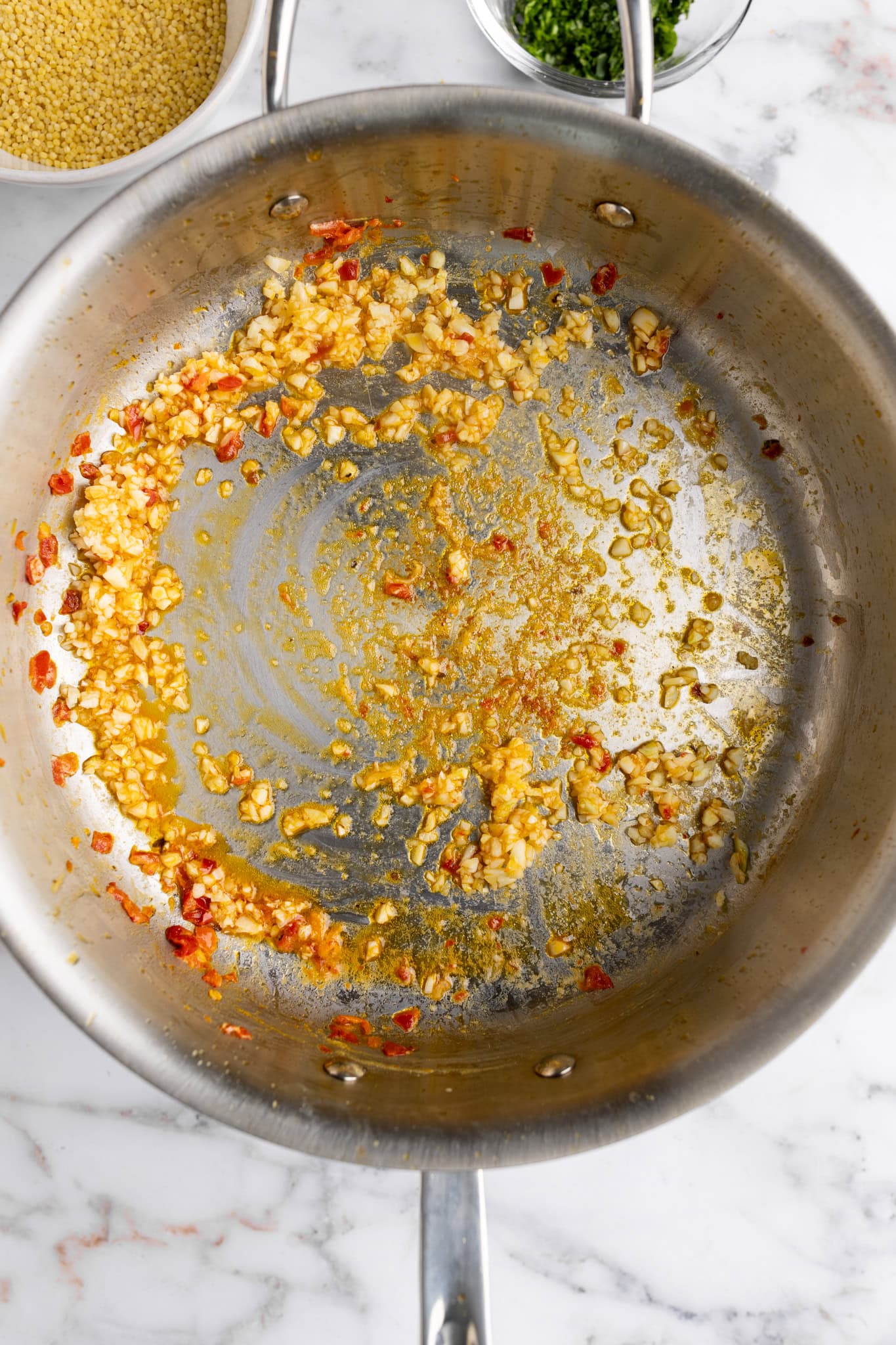 step by step, shrimp removes, sautéing the garlic