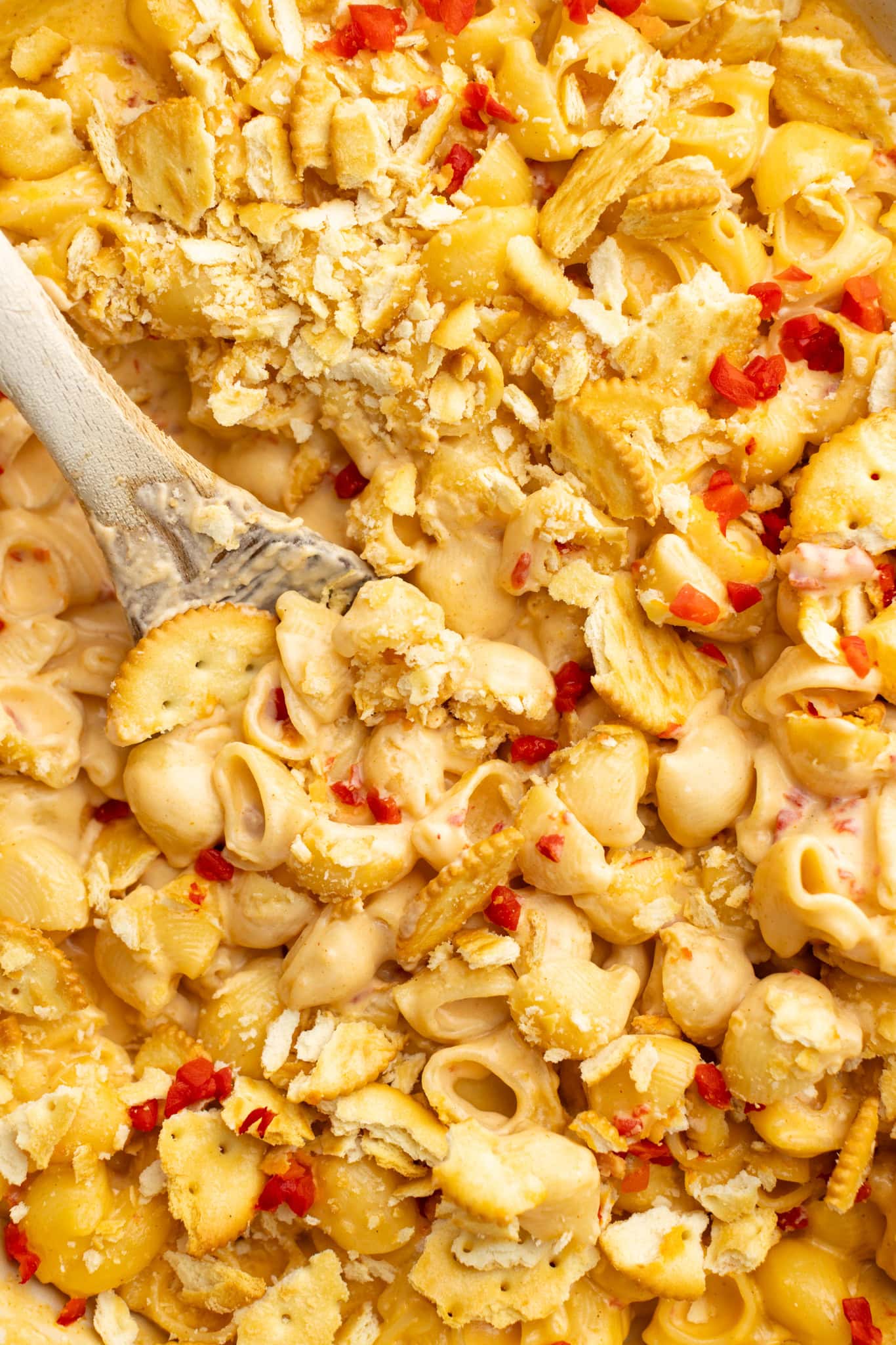 up close shot of pimento mac and cheese with a Ritz cracker crust.