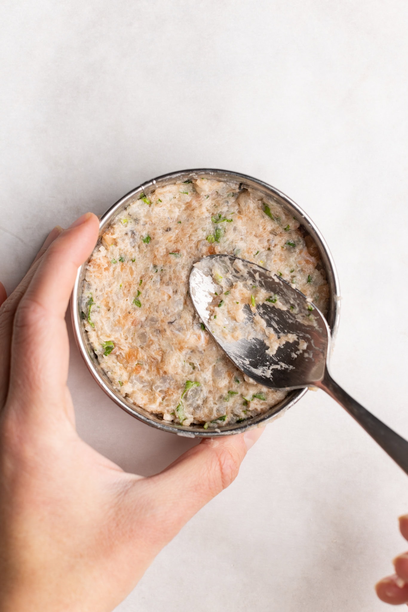 step by step: forming the salmon and shrimp burgers.