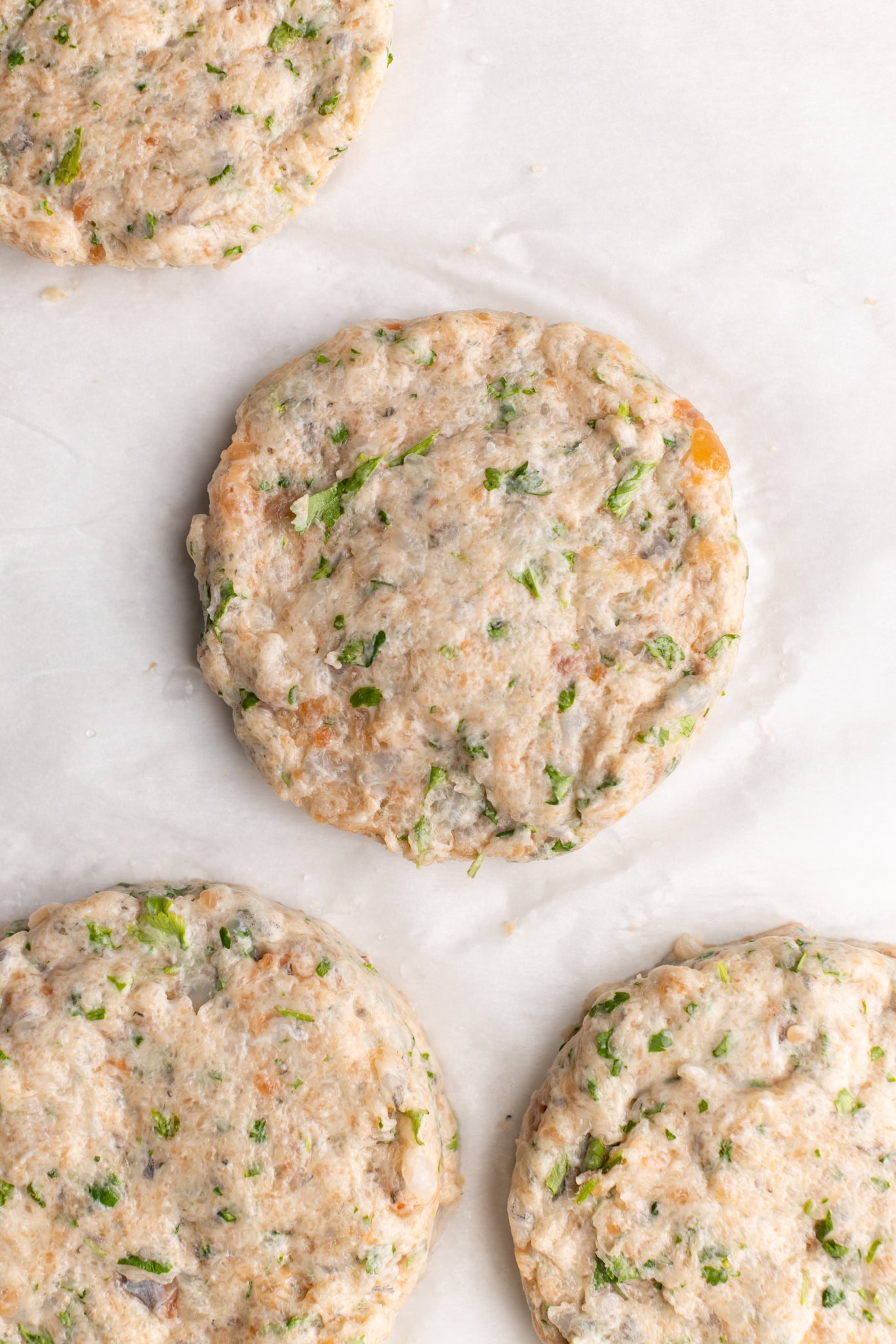 step by step: formed salmon and shrimp burgers.
