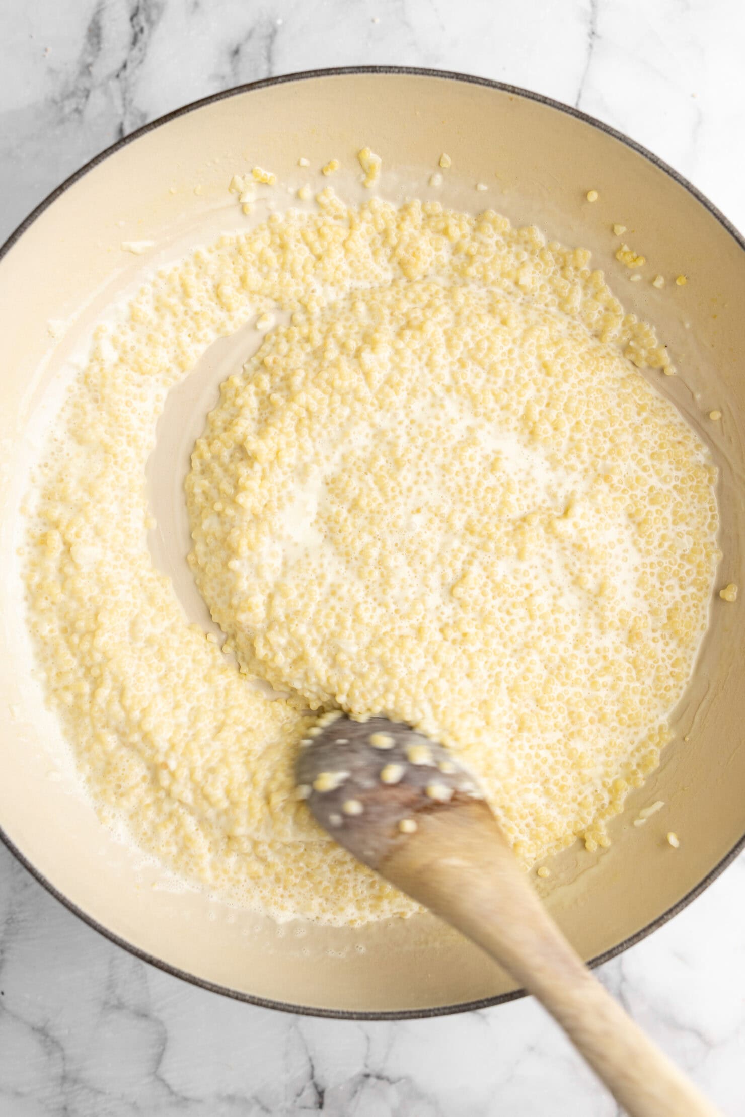 step by step: nearly cooked garlic parmesan pastina.
