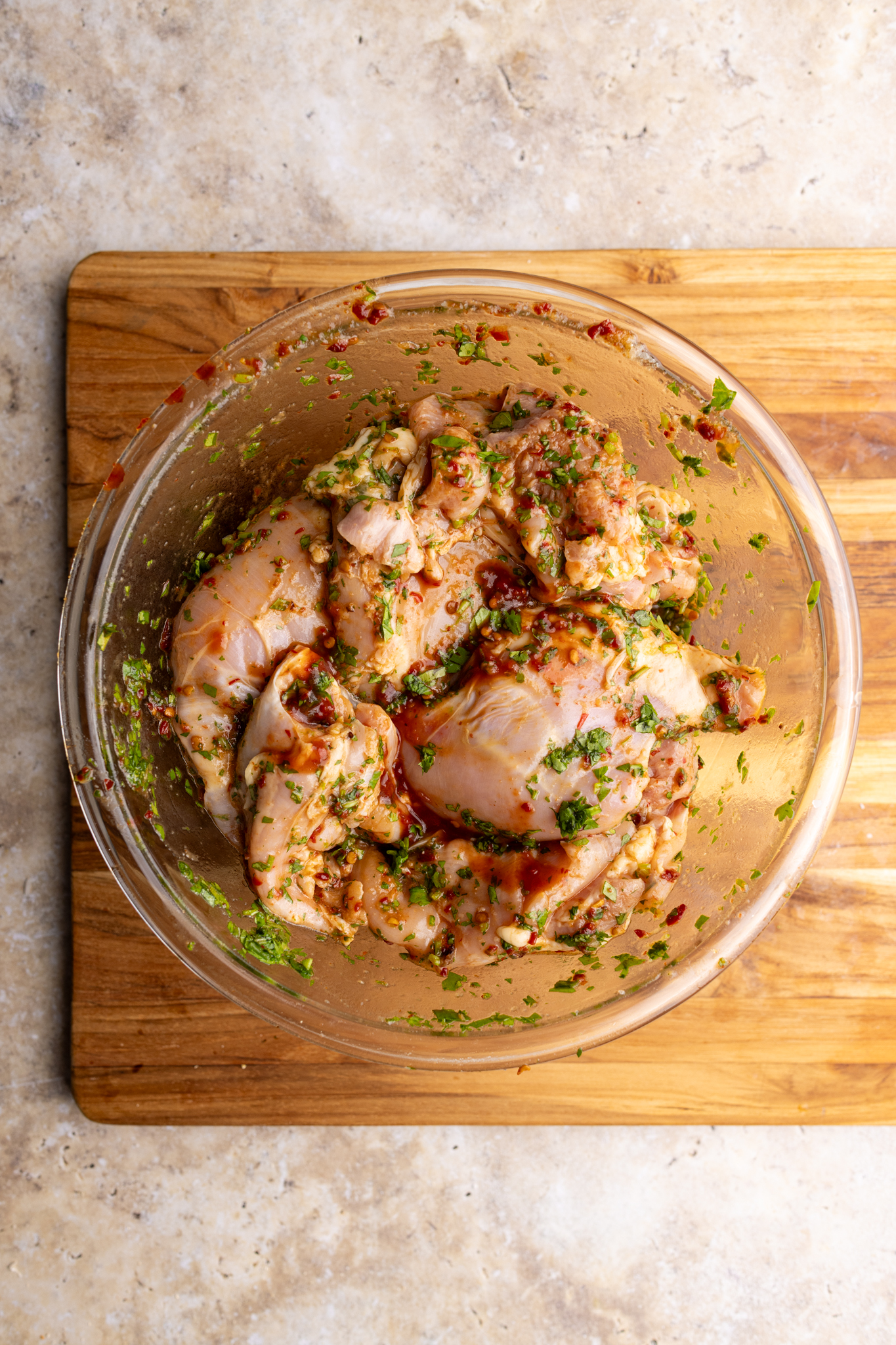 step by step: marinating the chicken thighs.