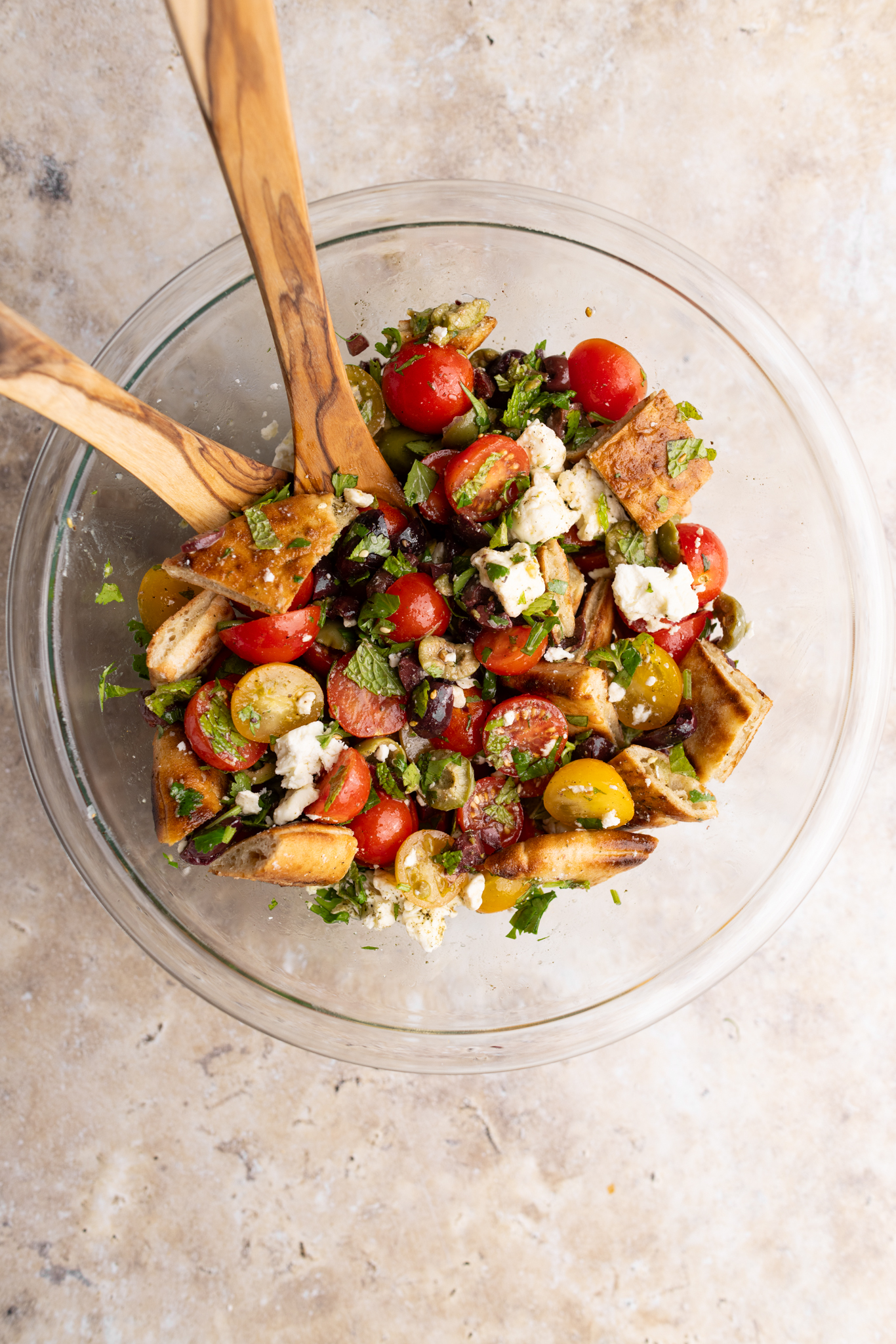 step by step: tossing the panzanella salad